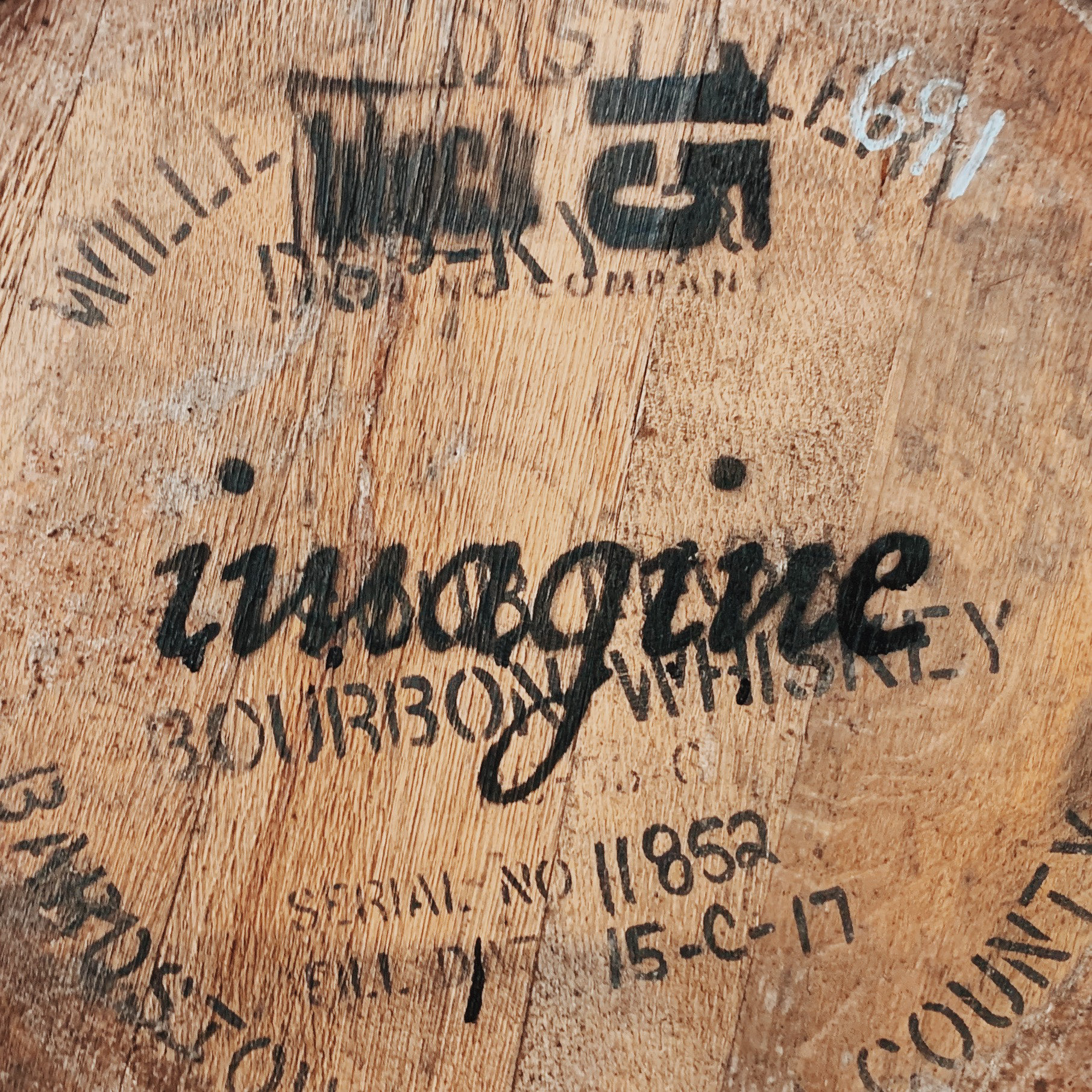 Whiskey barrel top with various markings